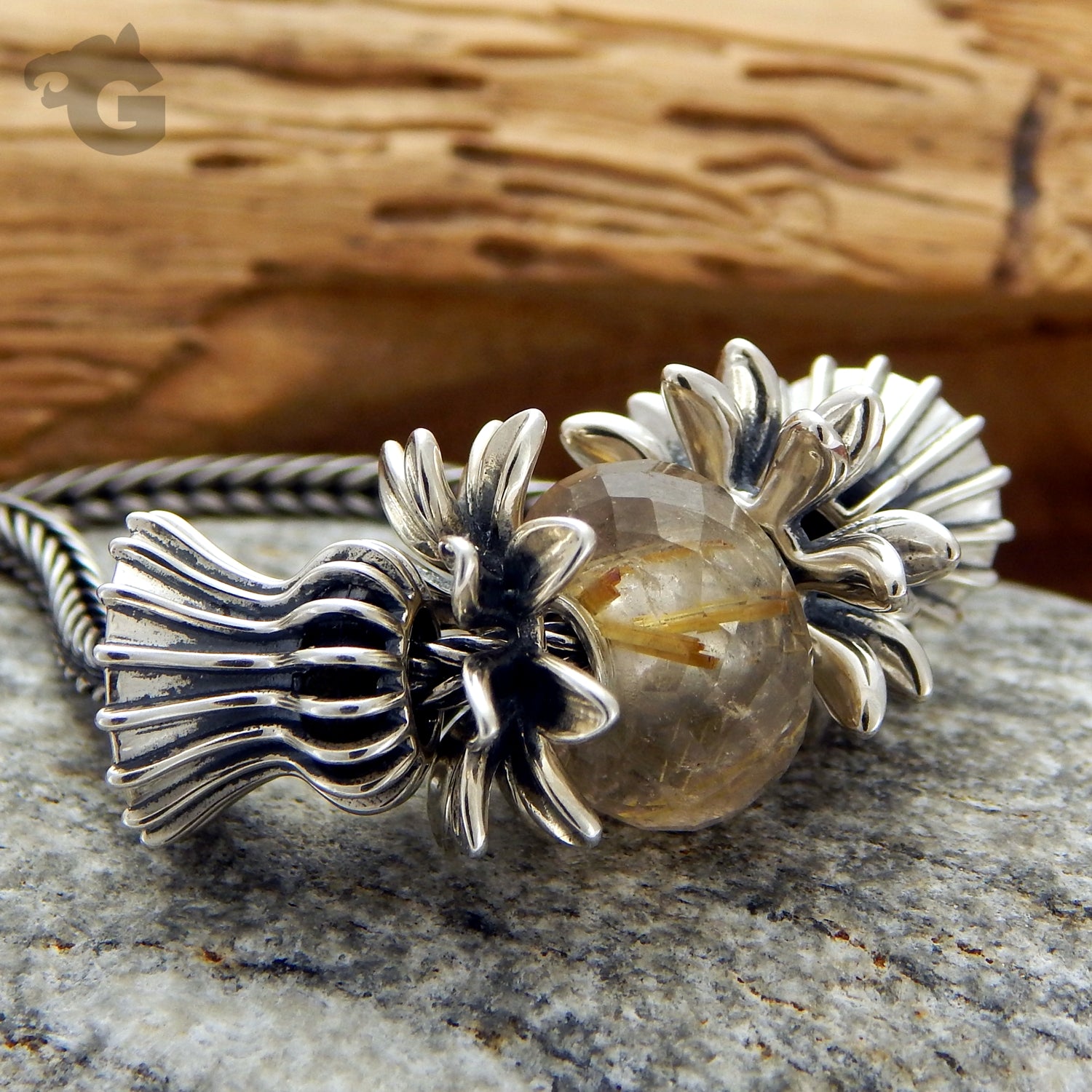 Lotus Rays silver charm