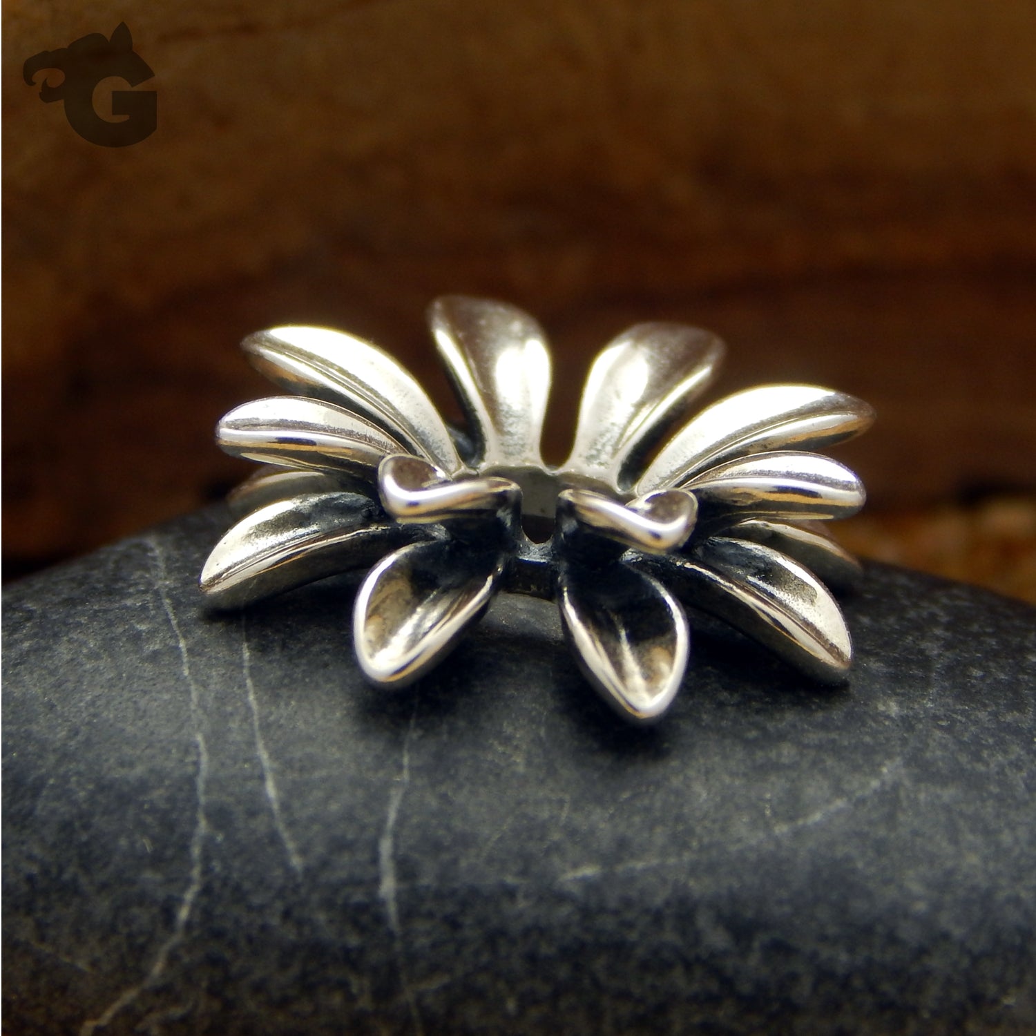 Lotus Rays silver charm